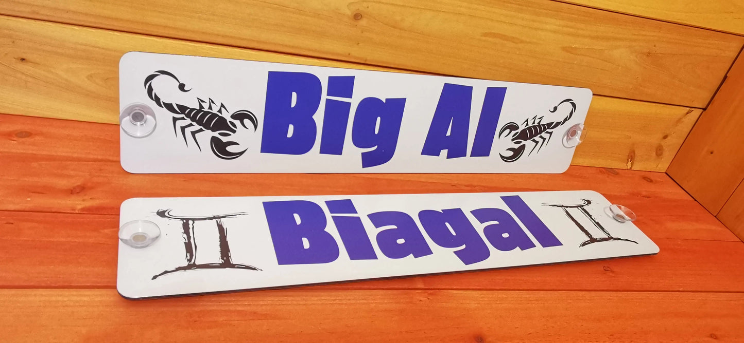 Custom truck nameplates with suction cups displaying 'Big Al' and 'Biagal', featuring decorative scorpion and zodiac symbols.