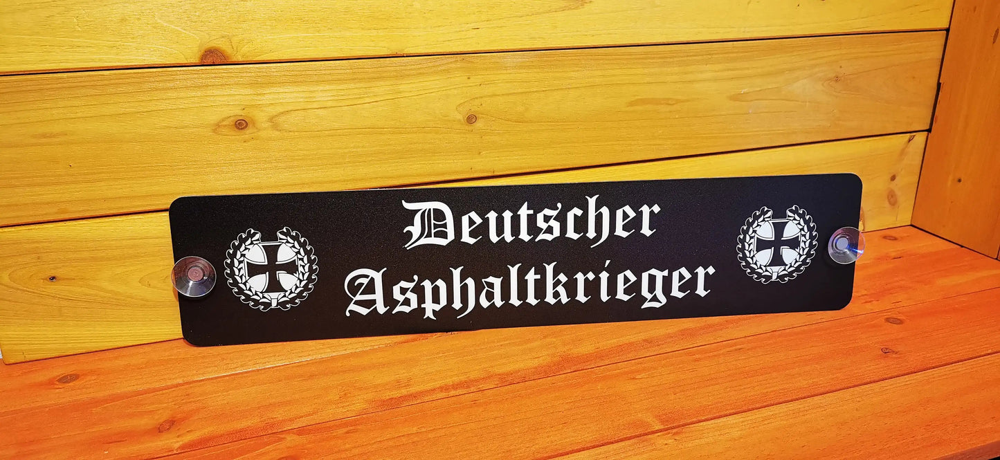 Stylish 'Deutscher Asphaltkrieger' LKW nameplate with suction cups on wooden surface, printed on durable Aludibond.