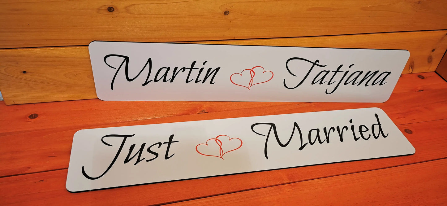 Personalized wedding car signs with names and 'Just Married', featuring elegant script and heart design on durable material.