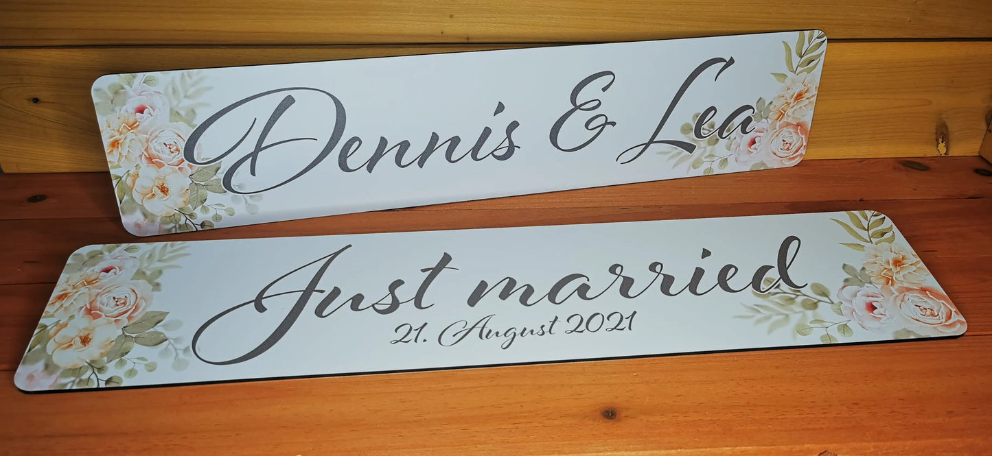 Personalized wedding car signs with floral design and 'Just Married' message, perfect for wedding decorations.