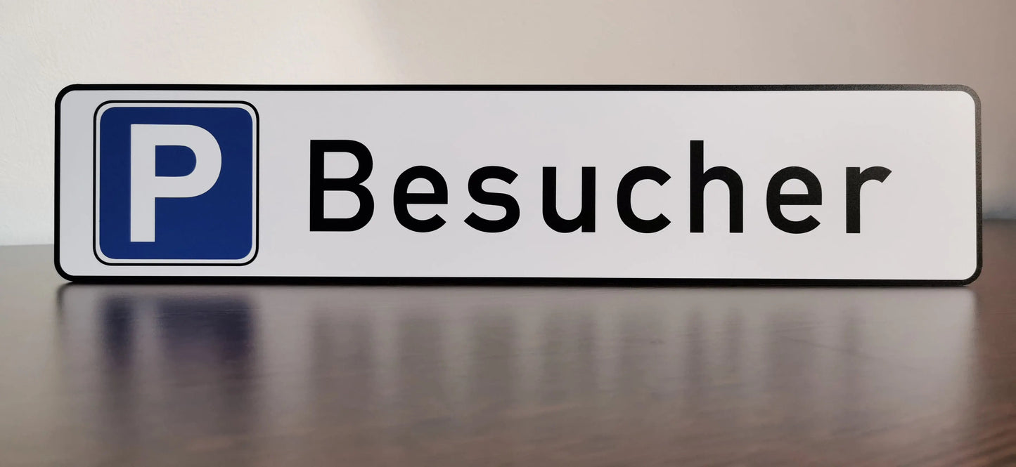 Parkplatzschild aus Aludibond mit 'Besucher'-Beschriftung in Schwarz auf weißem Hintergrund, wetterfest und UV-beständig.
