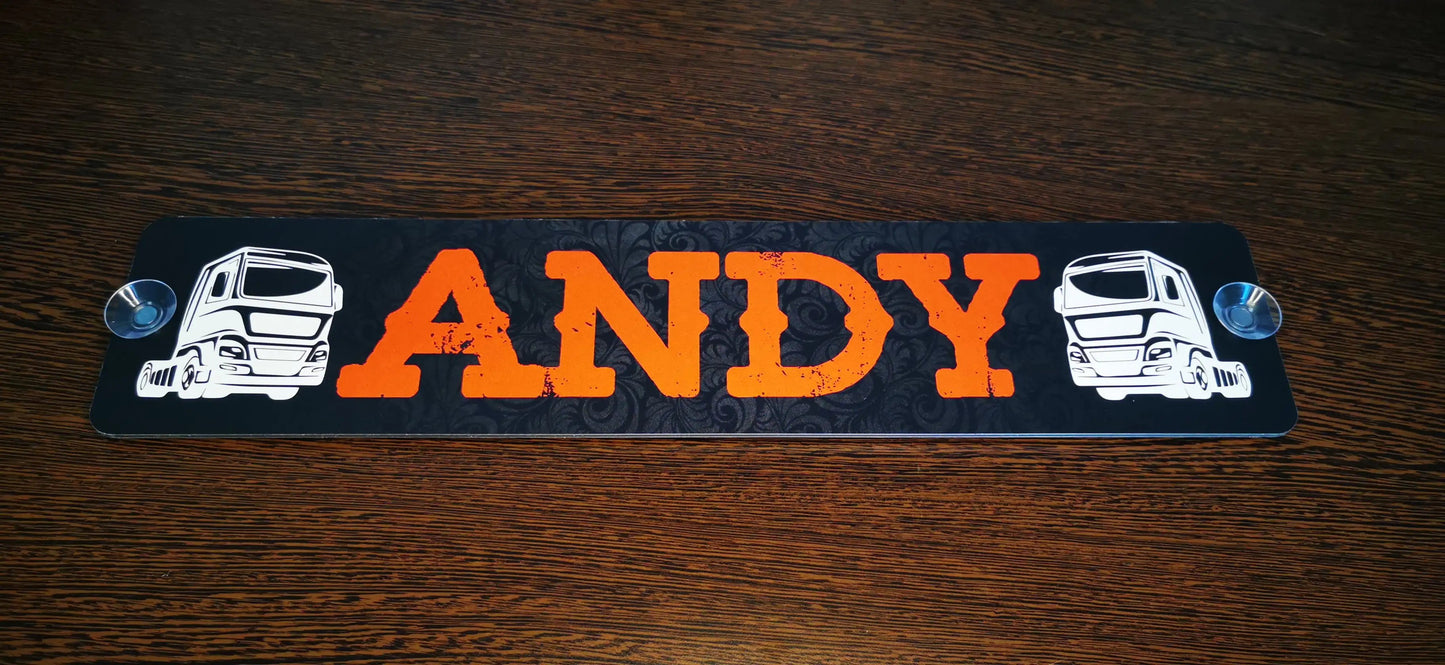 Personalized truck nameplate with the name 'Andy' printed on aluminum, featuring truck graphics and suction cups for easy installation.