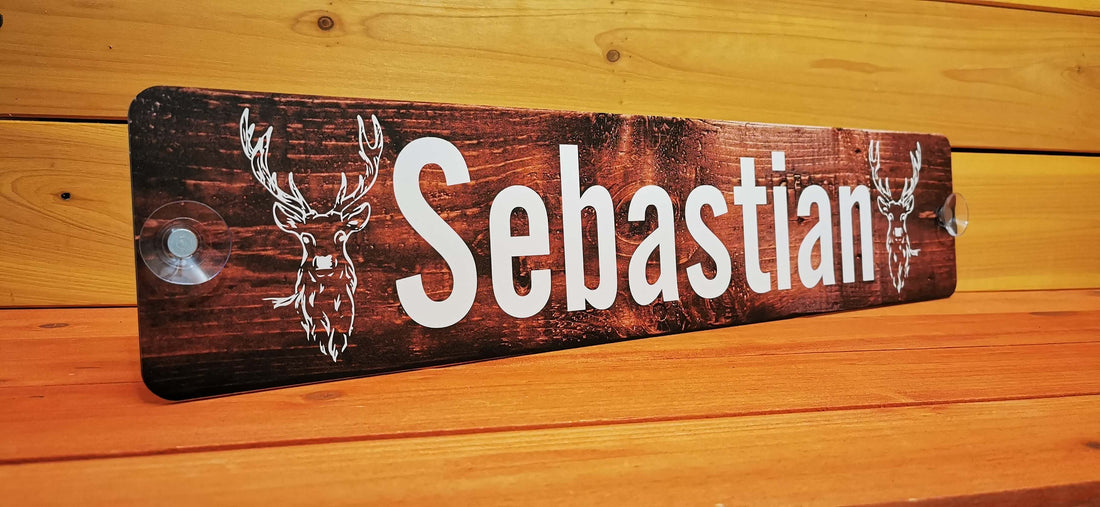 Custom wooden truck name plaque 'Sebastian' with deer design, unlit, recently delivered.