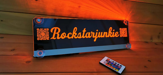 Beleuchtetes LKW Namensschild mit "Rockstarjunkie"-Design und USB Anschlusskabel, LED-Beleuchtung in Orange, mit Fernbedienung.