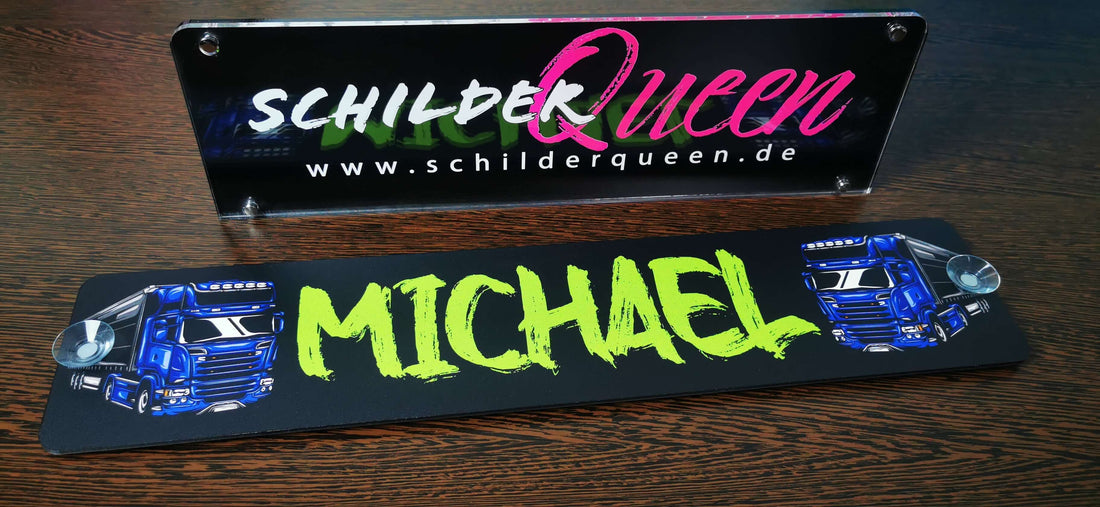 Custom truck driver nameplate with 'Michael' in neon green and truck graphics from Schilderqueen.