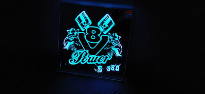 LED-illuminated truck mirror back panel with V8 Power graphic, customizable design with RGB lighting.