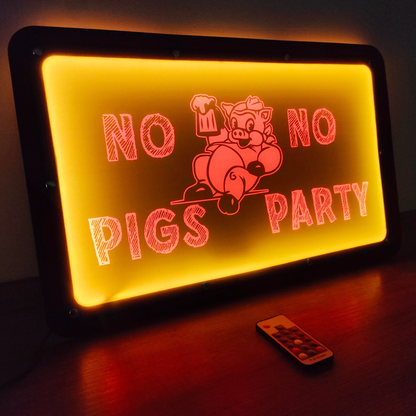 Illuminated LED sign with 'No Pigs No Party' slogan, featuring a cheerful pig holding a drink, and a remote control on the surface.