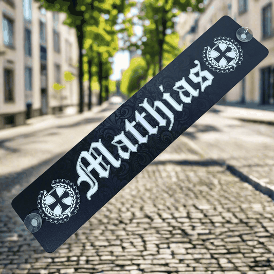 "Matthias" nameplate in Gothic style, mounted with suction cups on a weathered background, offering a discounted B-Ware product.