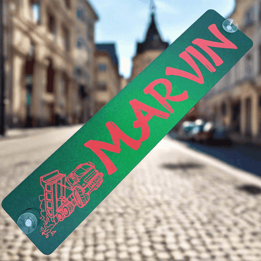 Green and red "MARVIN" truck nameplate with suction cups on aluminum composite board, clearance sale item with minor imperfections.