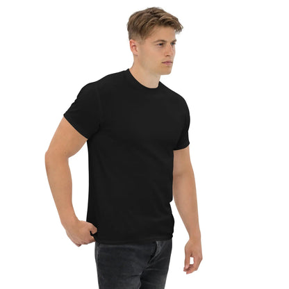 Man wearing a classic black Herren-T-Shirt by MÖBLER, 100% cotton, showcasing sleek design and fit, ideal for fashion-forward layering.