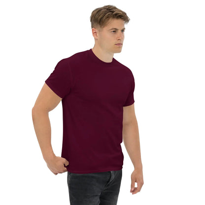 Model wearing a classic men's T-shirt in rich burgundy, made from 100% cotton, showcasing structured fit, ideal for layering.