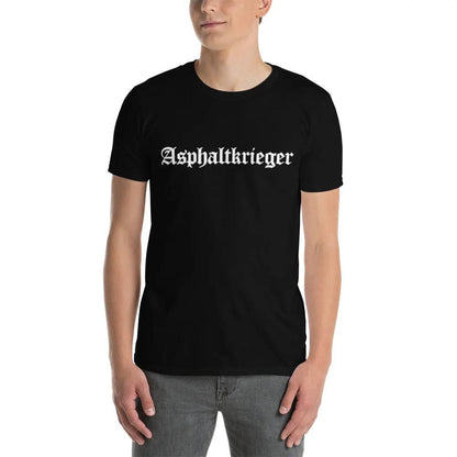Man wearing a black "Asphaltkrieger" short-sleeve unisex T-shirt, made of thick, soft cotton, featuring durable double stitching.