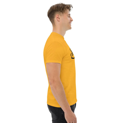 Side view of a man wearing a bright yellow T-shirt with an inspirational message, showcasing a casual and confident look.