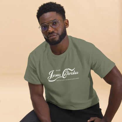 Man wearing a green T-shirt with the message 'Erlebe Jesus Christus und du wirst nie mehr Durst haben', sitting against a neutral background.
