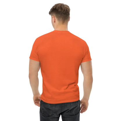 Back view of a man wearing an orange T-shirt showcasing classic fit and short sleeves, paired with black jeans.