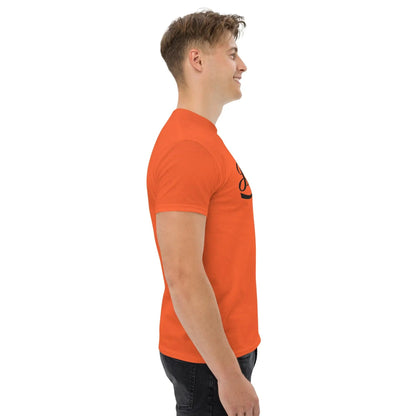 Side view of man wearing orange T-shirt with 'Erlebe Jesus Christus' design, made of 100% cotton for a bold faith statement.
