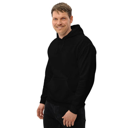 Man wearing a black "Dieselknecht" hoodie, showcasing its comfortable and stylish design, ideal for cool evenings with soft fabric blend.