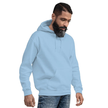 Man wearing a light blue hoodie with hands in pockets, showcasing casual style and comfort.