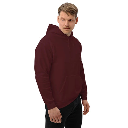 Man wearing a maroon hoodie with pockets, looking sideways, showcasing the comfortable and stylish design of the "Dieselknecht" hoodie.