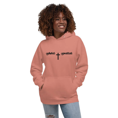 Woman wearing a 'geliebt gerettet' hoodie with cross design, showcasing style and comfort in a cozy, cotton-poly blend, with kangaroo pocket.