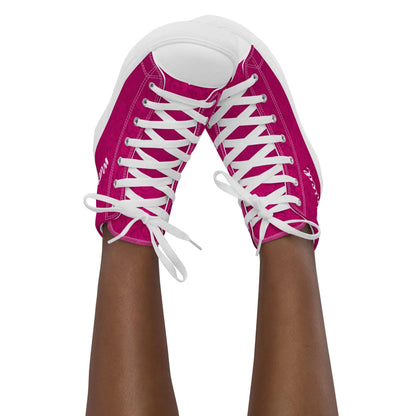 Pink 'Just Married' sneakers on feet, bridal footwear with stylish design, ideal for weddings, enhancing the bride's wardrobe.