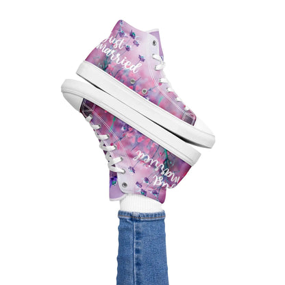 Stylish ‘Just Married’ high-top sneakers for women with floral design; perfect wedding day footwear with a unique and vibrant look.