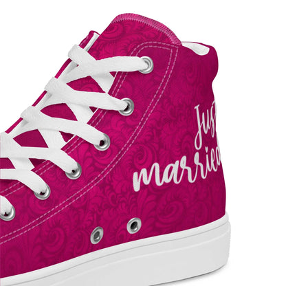 Pink high-top "Just married" sneakers for women, featuring white laces and stylish design, perfect for a wedding celebration.