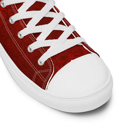 Close-up of red 'Just Married' sneaker with white laces, featuring a stylish floral pattern, perfect for weddings.