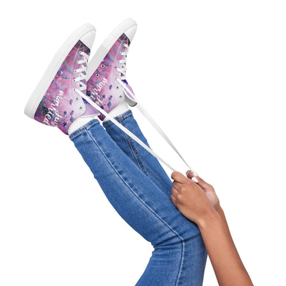 Woman wearing 'Just Married' sneakers with colorful design, perfect for wedding day style and comfort.