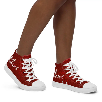 Woman wearing red high-top sneakers with 'Just Married' design, perfect for weddings and stylish comfort.