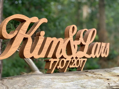 3D wooden family name sign 'Kim & Lars' with date, crafted from high-quality hardwood, suitable for outdoor use, elegant design.
