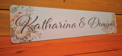 Custom wedding car license plate with floral design and names in elegant script