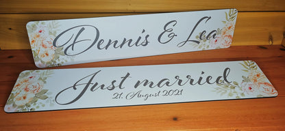 Personalized wedding car signs with floral design and 'Just Married' message, perfect for wedding decorations.