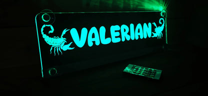 Illuminated LED truck nameplate with suction cup featuring custom 'Valerian' motif and scorpion design, ideal for truck decor.