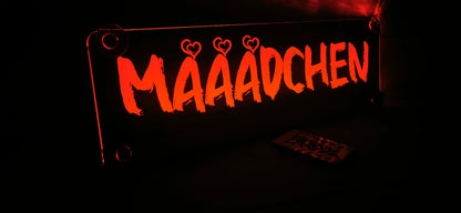 Red LED truck name sign with 'MAAADCHEN' text and hearts, featuring a suction cup for easy mounting.