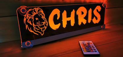 LED truck nameplate with lion design personalized for "Chris," featuring suction cups and remote control for adjustable lighting.