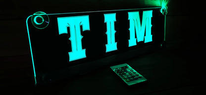 LED namesign for truck with suction cups, displaying 'TIM,' illuminated in green, ideal for personalized decoration and night lighting.